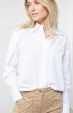 Witte blouse met rugdetail en blinde sluiting.