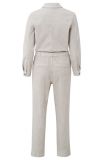 Denim jumpsuit van het merk Yaya met knoopsluiting, lange mouwen en een strikceintuur in de kleur moonbeam sand.