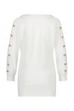 Gebreide trui met V-hals en lange mouwen met knopen in de kleur off white.