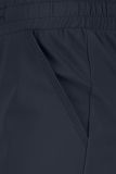 Driekwart travelbroek met opgestikte zakken en elastieken tailleband van het merk Studio Anneloes in de kleur donker blauw.