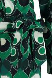Travelvel jumpsuit van het merk Studio Anneloes met all-over print, lange mouwen en een overslag in de kleur dark blue/green.