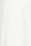 Travelbroek met rechte wijde pijpen en elastieken tailleband van het merk Studio Anneloes in de kleur off white.