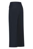 Travel broek met elastieken tailleband met riemlusjes, wijde pijpen en pockets met knoopsluiting aan de voorzijde van het merk Studio Anneloes in de kleur donker blauw.
