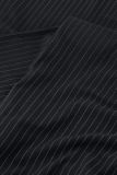 Traveljurk met pinstripe van het merk Studio Anneloes met ronde hals, powershoulders en lange mouwen in de kleur zwart/off white.