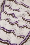Gebreide pullover met golfprint in de kleuren off white, paars en khaki van het merk Studio Anneloes.