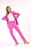 Travel broek van het merk Studio Anneloes met smalle pijp met splitje en elastieken tailleband in de kleur roze.