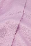 Feestelijk jasje met driekwart mouwen, plooien op de schouder en bijpassend strikceintuur van het merk Studio Anneloes in de kleur lila.