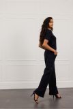 Pantalon van travelmateriaal met steekzakken en wijde pijpen van het merk Studio Anneloes in de kleur navy.