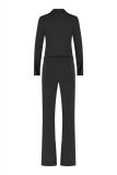 Travel jumpsuit van het merk Studio Anneloes met lange mouwen, wijde pijpen, een knoopsluiting en een strikceintuur in de kleur zwart.