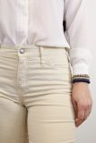 Skinny fit jeans met high waist en splitje met klinknagels van het merk Rosner in de kleur shell. 