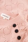 Gebreide trui met opgengewerkte hartjes in de kleur alpaca pink.