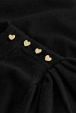 Gebreide trui met ronde hals en lange mouwen en vier hartjes knopen op de schouder van het merk Fabienne Chapot in de kleur zwart.
