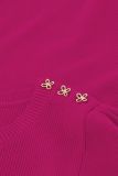 Geribde top van het merk Fabienne Chapot met korte pofmouwen en sierlijke knoopjes op de schouder in de kleur hot pink.