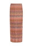 Lange rok met zig zag patroon, elastieken tailleband en split in de kleur oranje.