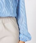 Blousetop van het merk Esqualo met V-hals, knoopjes, lange mouwen en een gesmockt boord in de kleur blauw.
