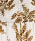 Wijde zomerbroek van het merk Esqualo met palmprint, volantpijpen en elastieken tailleband in de kleur off white.