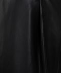 Mouwloze PU jumpsuit met overslag en strikceintuur van het merk ESqualo in de kleur zwart.