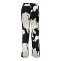 Wijde broek met elastieken tailleband en bloemenprint van het merk Geisha in de kleur zwart/off white.