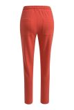 Rode broek van het merk Milano met elastieken taillband.