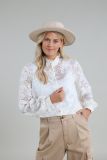 Geborduurde blouse met lange mouwen en ruches van het merk Nukus in de kleur off white.