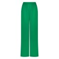 Broek van het merk Nukus met wijde pijpen en elastieken tailleband in de kleur groen.