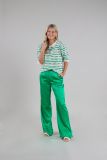 Wijde broek met elastieken tailleband van het merk Nukus in de kleur groen.