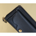 Leren portemonnee van het merk Loulou met telefoonvakje in de kleur zwart.