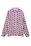 Ecru blouse van het merk Pom Amsterdam met puntkraag, volledige knoopsluiting en lange mouwen met manchetten met een all-over bloemenprint in ecru/multi color.