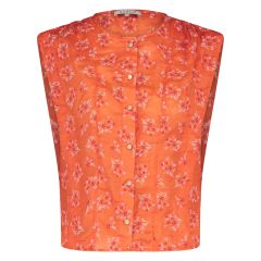 Mouwloze top van geborduurde stof met ronde hals en knoopsluiting van het merk Nukus in de kleur oranje.